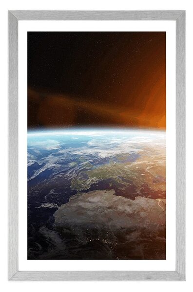 Plakat z passe-partout widok planety z kosmosu