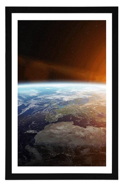 Plakat z passe-partout widok planety z kosmosu