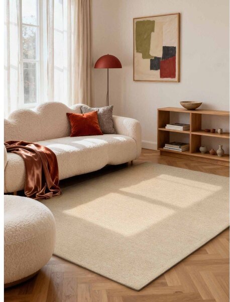 Beżowy wełniany dywan tkany ręcznie 140x200 cm Puristic Knots – Elle Decoration