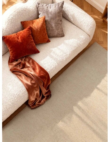 Beżowy wełniany dywan tkany ręcznie 140x200 cm Puristic Knots – Elle Decoration