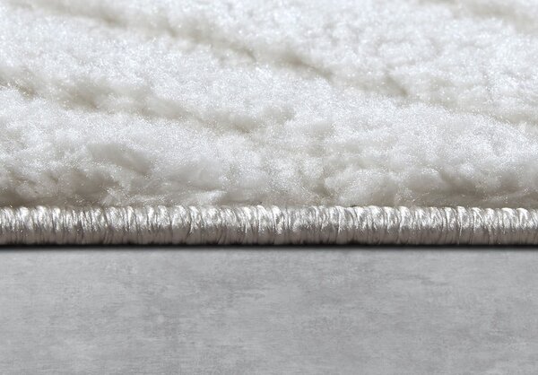 Kremowy dywan 80x120 cm Pigment Cream White – Elle Decoration