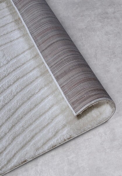 Kremowy dywan 80x120 cm Pigment Cream White – Elle Decoration
