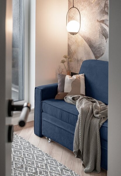 Ciemnoniebieska rozkładana sofa 168 cm Lucky Lucy – Miuform