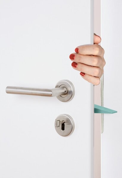 Zielony stoper do drzwi i okien Wenko Multi-STOP®