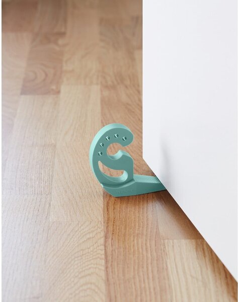 Zielony stoper do drzwi i okien Wenko Multi-STOP®