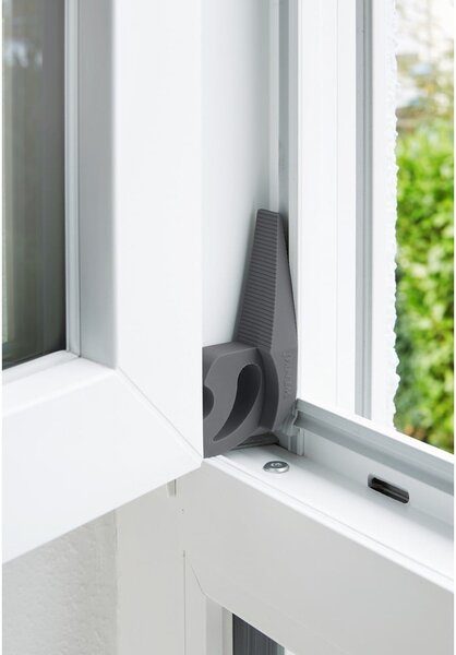 Ciemnoszary stoper do drzwi i okien Wenko Multi-STOP®