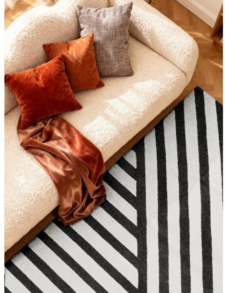 Czarno-biały wełniany dywan tkany ręcznie 120x180 cm Stryve Noir – Elle Decoration