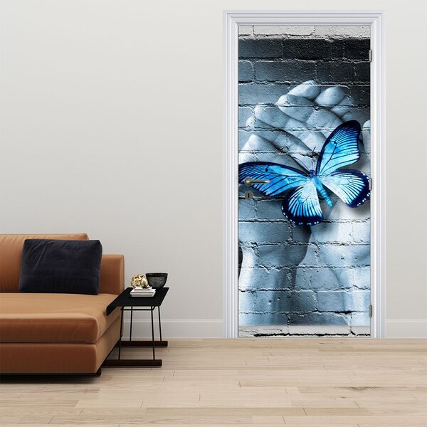 Fototapeta na drzwi - Niebieski motyl na ścianie (95x205cm)
