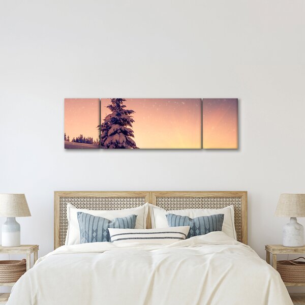 Obraz ośnieżonego drzewa na łące (170x50 cm)