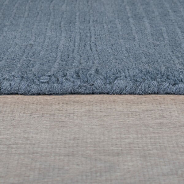 Ciemnoniebieski wełniany dywan tkany ręcznie 120x170 cm Textured Wool Border – Flair Rugs