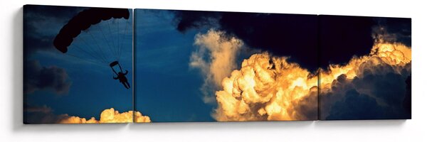 Obraz skoczka spadochronowego w chmurach (170x50 cm)