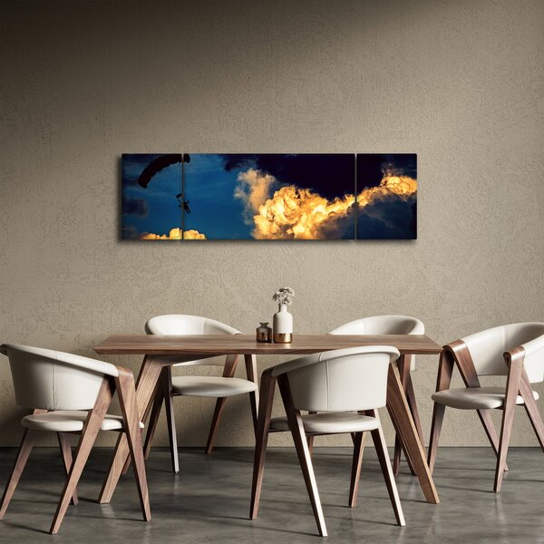 Obraz skoczka spadochronowego w chmurach (170x50 cm)
