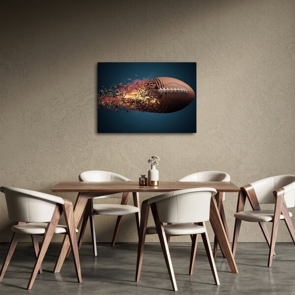 Obraz - Piłka do rugby w akcji (70x50 cm)