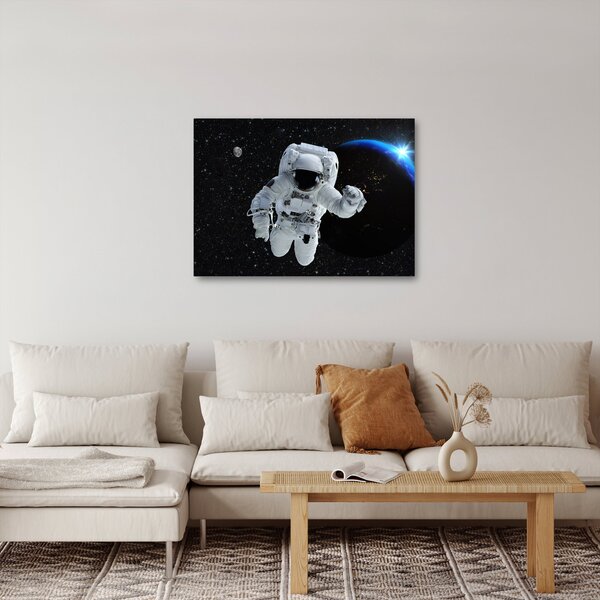 Obraz - Astronauta w kosmosie (70x50 cm)
