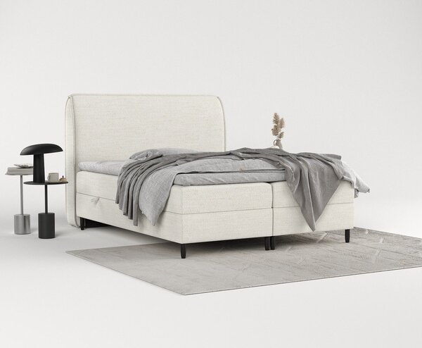 Kremowe łóżko boxspring ze schowkiem 180x200 cm Melba – Maison de Rêve