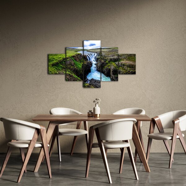 Obraz wodospadu między skałami (125x70 cm)