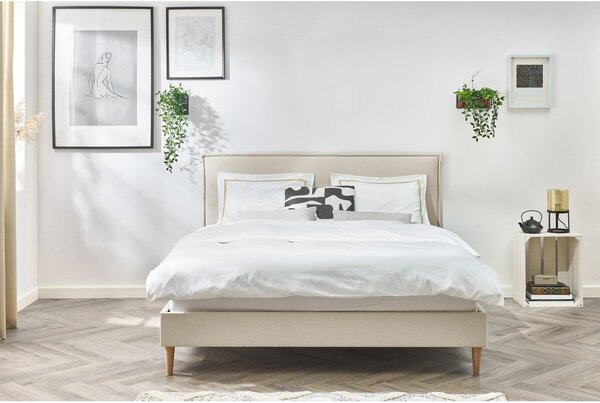 Beżowe tapicerowane łóżko dwuosobowe ze stelażem 180x200 cm Sary – Bobochic Paris