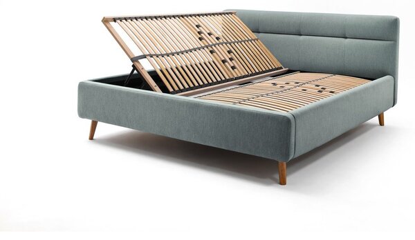 Jasnoniebieskie tapicerowane łóżko dwuosobowe ze schowkiem ze stelażem 160x200 cm Lotte – Meise Möbel