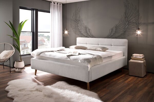 Jasnoszare tapicerowane łóżko dwuosobowe ze schowkiem ze stelażem 180x200 cm Lotte – Meise Möbel