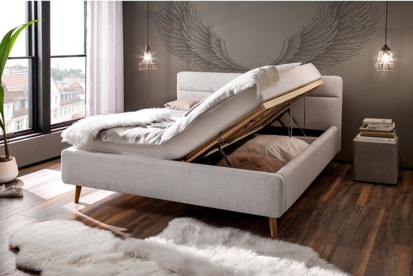 Jasnoszare tapicerowane łóżko dwuosobowe ze schowkiem ze stelażem 180x200 cm Lotte – Meise Möbel