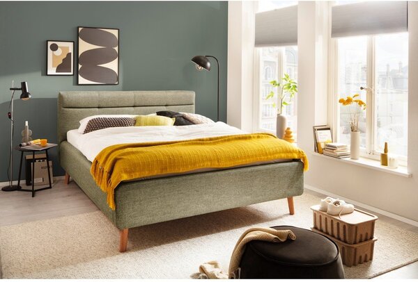 Zielone tapicerowane łóżko dwuosobowe ze schowkiem ze stelażem 160x200 cm Lotte – Meise Möbel