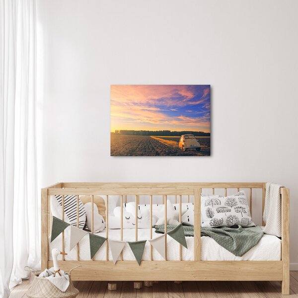 Obraz żółtego samochodu na polu (70x50 cm)