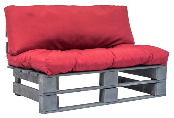 Sofa ogrodowa z palet z czerwonymi poduszkami, drewno