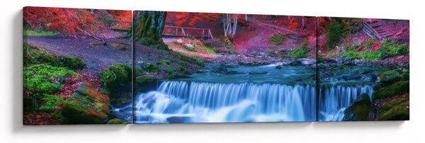 Obraz wodospadu w czerwonym lesie (170x50 cm)