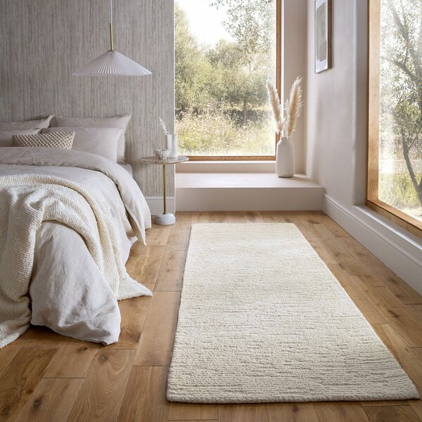 Wełniany chodnik tkany ręcznie w kolorze kości słoniowej 80x230 cm Harris Boucle – Flair Rugs