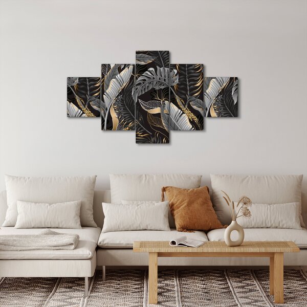 Obraz - Tropikalne liście w kolorze czarno - złotym (125x70 cm)