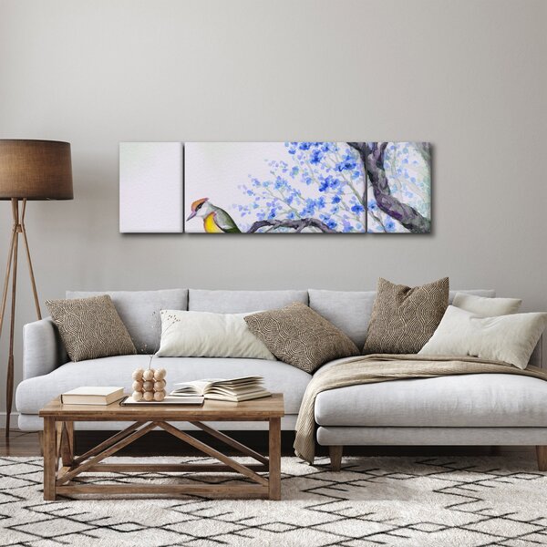 Obraz - ptak na drzewie z niebieskimi kwiatami (170x50 cm)