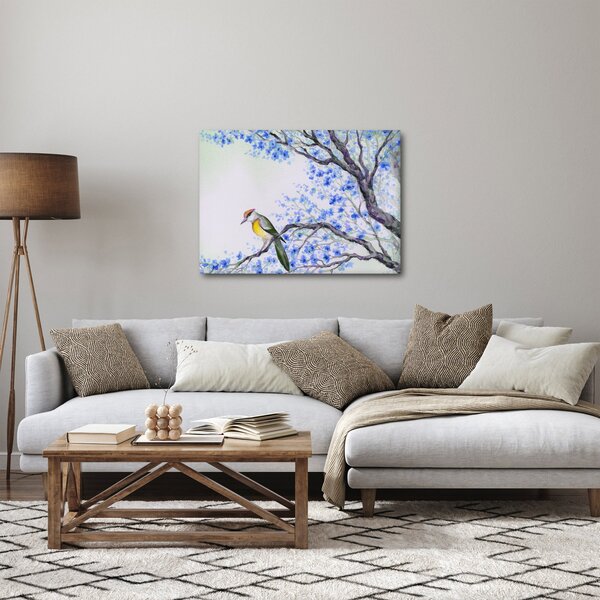 Obraz - ptak na drzewie z niebieskimi kwiatami (70x50 cm)