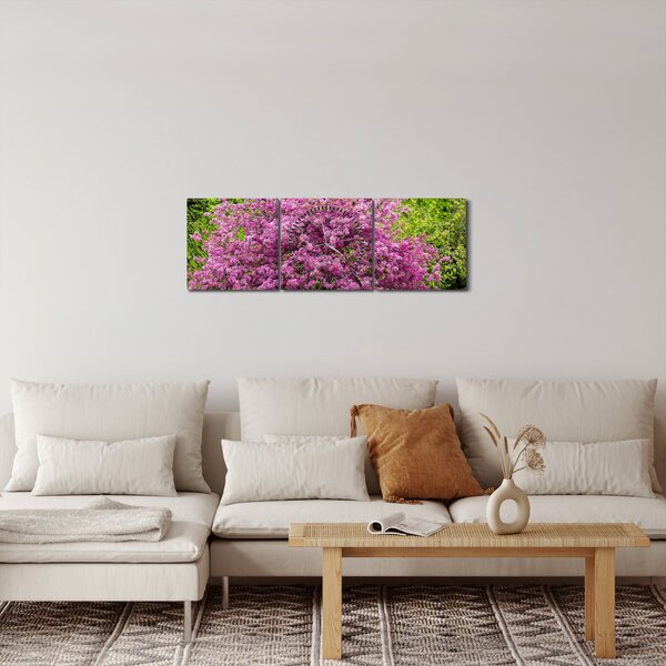 Obraz kwitnącego drzewa na łące (z zegarem) (90x30 cm)
