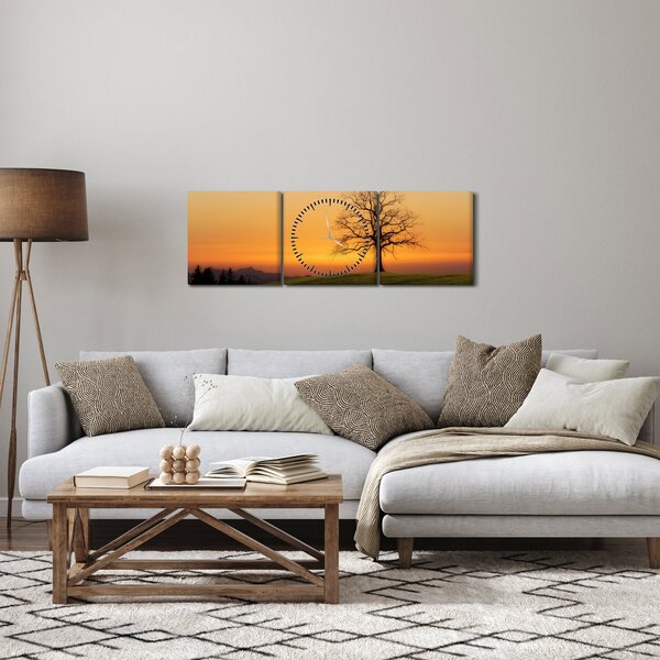 Obraz zachodu słońca na łące (z zegarem) (90x30 cm)