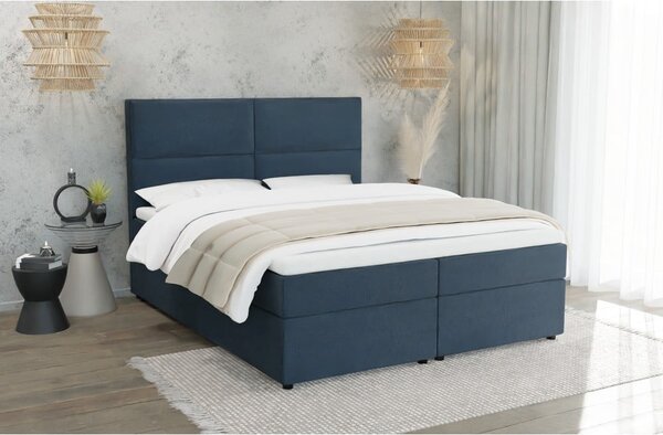 Ciemnoniebieskie łóżko boxspring ze schowkiem 140x200 cm Rico – Ropez