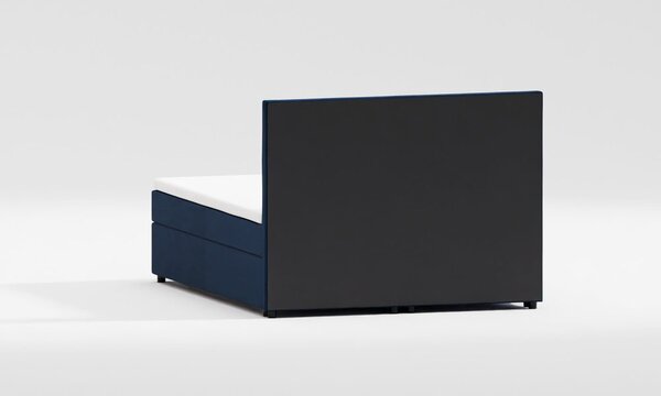 Ciemnoniebieskie łóżko boxspring ze schowkiem 140x200 cm Rico – Ropez