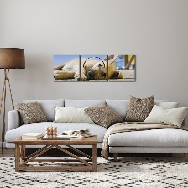Obraz leżącego szczeniaka (z zegarem) (90x30 cm)