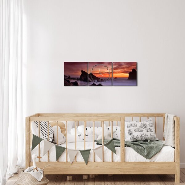 Obraz zachodu słońca na wybrzeżu (z zegarem) (90x30 cm)