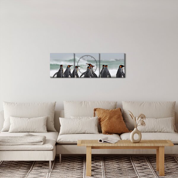 Obraz pingwinów nad oceanem (z zegarem) (90x30 cm)