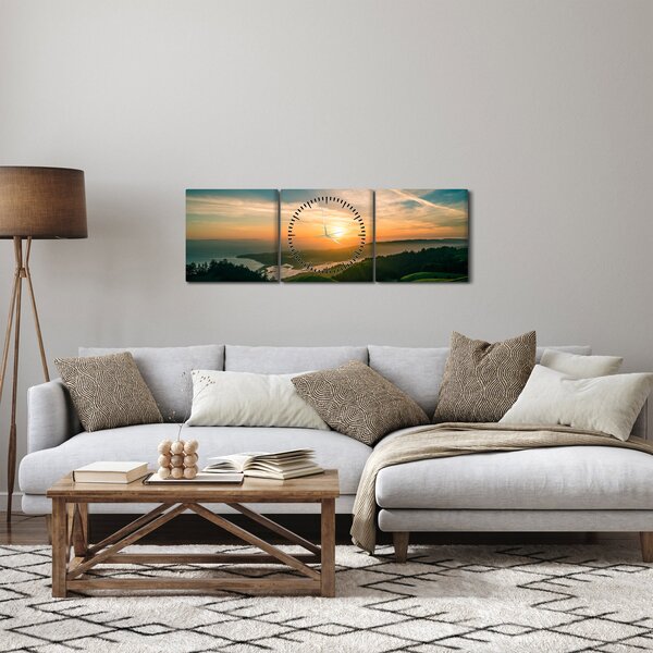 Obraz wschodu słońca nad morzem (z zegarem) (90x30 cm)