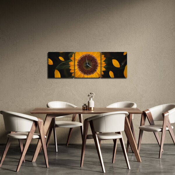Obraz - Słonecznik i płatki kwiatów (z zegarem) (90x30 cm)