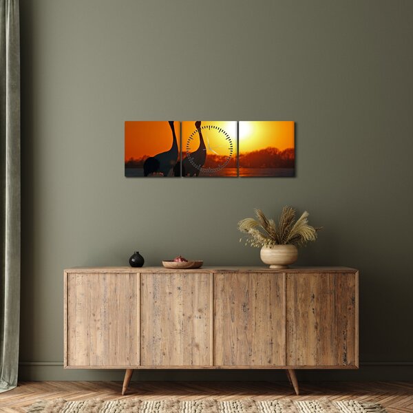 Obraz ptaków o zachodzie słońca (z zegarem) (90x30 cm)