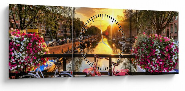 Obraz - Wschód słońca w Amsterdamie (z zegarem) (90x30 cm)
