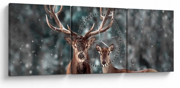 Obraz - Jeleń i łania w zaśnieżonym lesie (z zegarem) (90x30 cm)