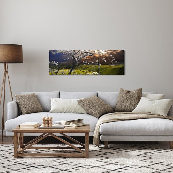 Obraz - Kwitnące drzewo w krajobrazie (z zegarem) (90x30 cm)
