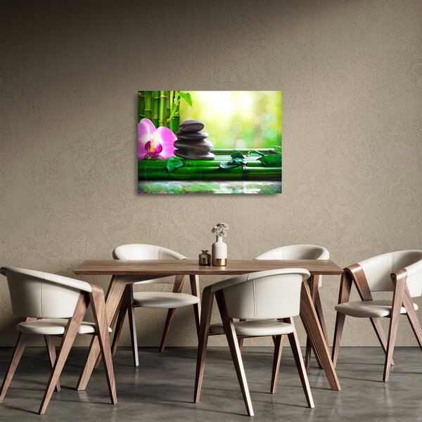 Obraz na szkle - kamienie do masażu i storczyki na wodzie (70x50 cm)