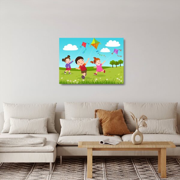 Obraz na szkle - Dzieci latają latawcem (70x50 cm)