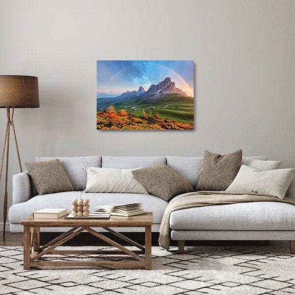 Obraz na szkle tęczy nad skałami (70x50 cm)
