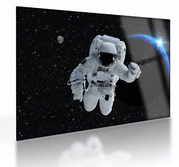 Obraz na szkle - Astronauta w kosmosie (70x50 cm)