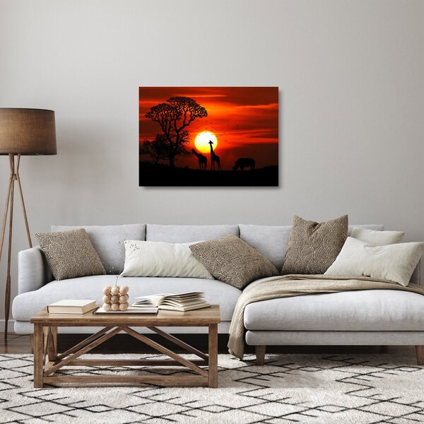 Obraz na szkle - Sylwetki zwierząt o zachodzie słońca (70x50 cm)